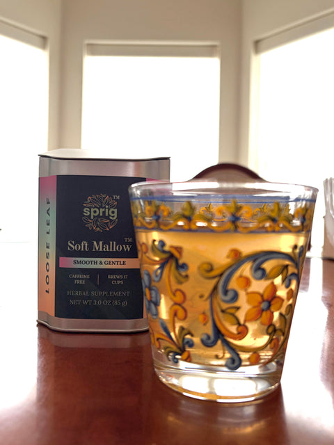 Decorate glass filled with Sprig Herbal's Soft Mallow Long Infusion